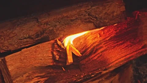 Close up of burning firewood creating a warm cozy bonfire Stock Footage 324665166