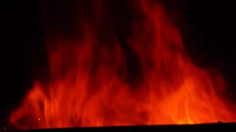 A close-up of burning flames shows the fire effects with their realistic Video stock 293058767