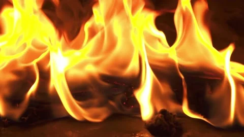 Close up of burning fuel-soaked rag in slow motion. Stock Footage 144673105