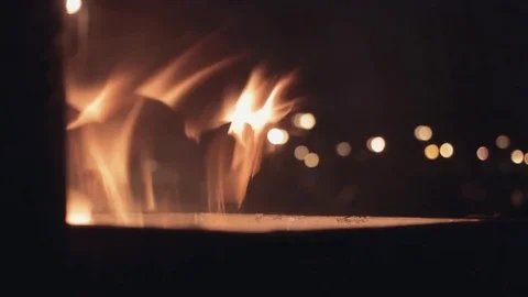 Close up of burning garbage can on the city street at night Stock Footage 82241830