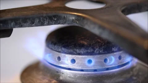 Close-up burning gas stove in the kitchen Stock Footage 154419043