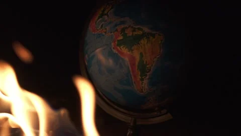 Close up of burning globe on destructed floor with a lot of rocks Stock Footage 152795609