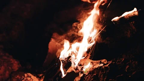 Close-up of a burning guitar lying on the ground. Tongue of flame Stock Footage 114519614