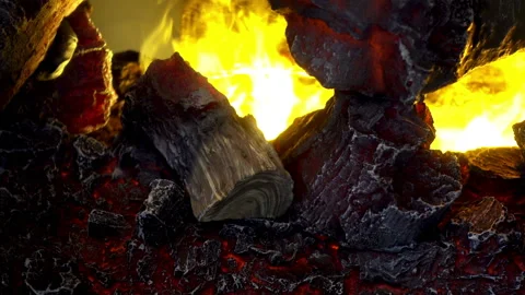 Close-up of burning logs with a bright orange flame. Stock Footage 87638925
