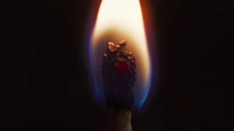 Close-up, burning match on black background in slow motion Stock Footage 337118306