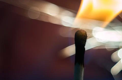 Close-up of a burning match Фото