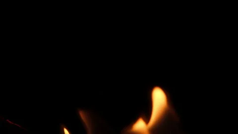 Close-up of burning paper with fire element isolated on black background. Stock Footage 232438137
