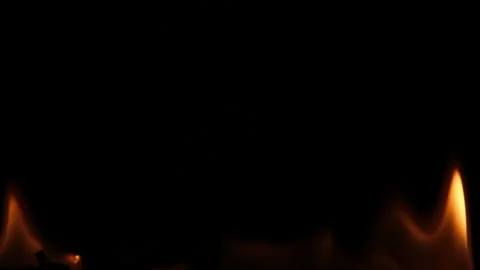 Close-up of burning paper with fire element isolated on black background. Stock Footage 232438268