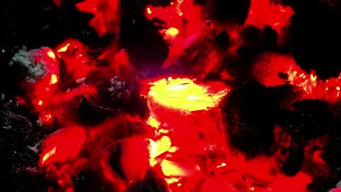 Close-up of burning wood producing a large flame. 4K Stock Footage 339044155