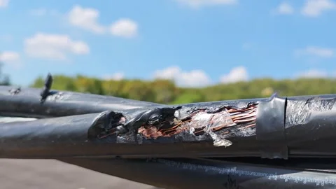 Close up of burnt high voltage electrical twisted cable insulation. Video stock 325181452