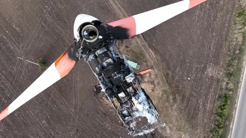 Close-up of a burnt out wind turbine. Wind energy farm turbine destroyed Stock Footage 262431344