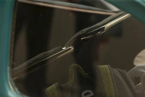 Close-up of bus or train interior with handrail and fabric seat Stock Photos