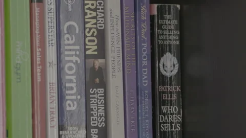 Close Up of Business and Self-Help Books on a Shelf 스톡 동영상 344603901