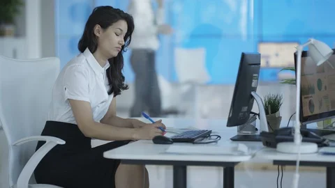 Close-up of business colleagues working on computer at desk in office Stock Footage 108130144