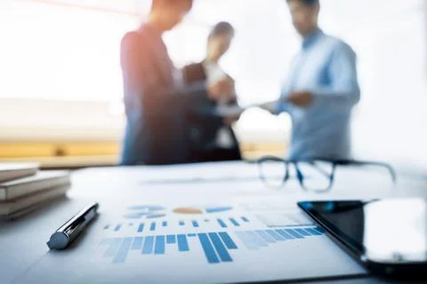 Close-up of business document in touchpad lying on the desk, office workers Stock Photos