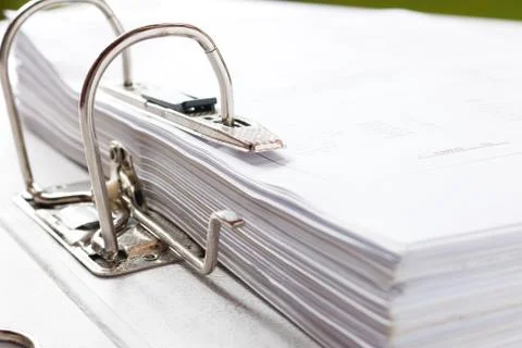 Close up of a business file folder with documents, storage of contracts. Stock Photos