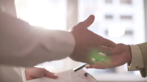A close-up of a business handshake between two unrecognizable people Stock-Footage 348738784