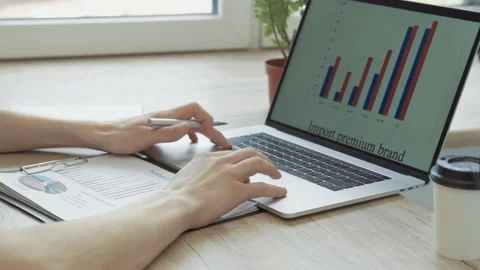Close up. business man using a laptop to check financial data. Stock Footage 157391560