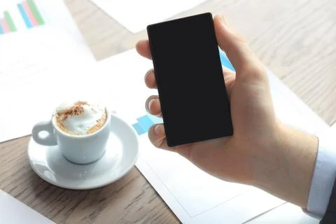 Close up of a business man using mobile smart phone Stock Photos
