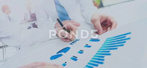 Close-up of business people working with documentation Stock Photos