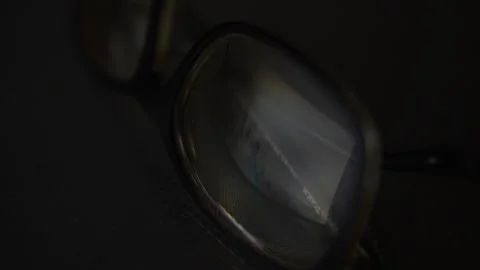 Close-up business trading chart reflected on the glasses. glasses reflection. Video stock 220425858