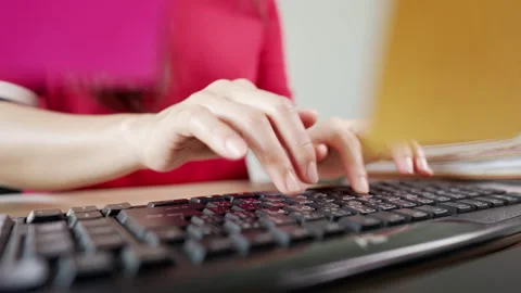 Close up A business woman's typing on computer keyboard at desk office, close Stock-Footage 157883051