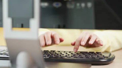 Close up A business woman's typing on computer keyboard at desk office, close Stock-Footage 157889180