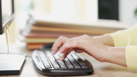 Close up A business woman's typing on computer keyboard at desk office, close Stock-Footage 157890137
