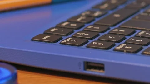 A close-up Business Workspace With Laptop, Printed Charts and Colorful Stic.. 動画素材 336409243