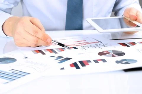 Close-up Of Businessman Analyzing Graph On Digital Tablet Stock Photos