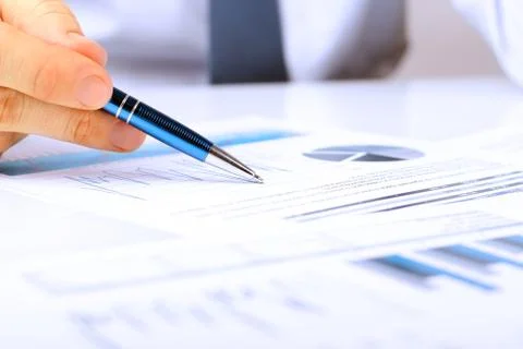 Close-up Of Businessman Analyzing Graph On Digital Tablet Stock Photos