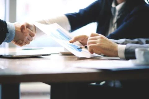Close up.businessman and assistant checking financial report Stock Photos
