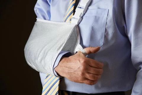 Close Up Of Businessman With Arm In Sling Stock Photos