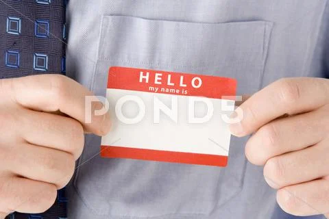Close Up Of Businessman Attaching Name Tag Stock Photos