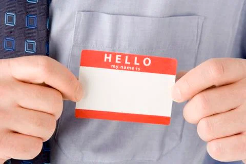 Close Up Of Businessman Attaching Name Tag Stock Photos