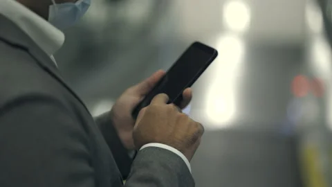 Close up businessman hand using smartphone check in flight in the airport. Stock Footage 159522940