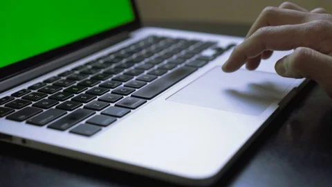 Close up of businessman hand using track pad on laptop in office. Green screen Stock Footage 80556290