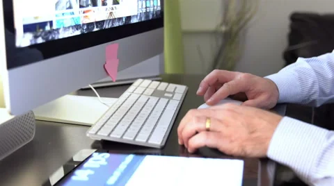 Close up of businessman hands typing on computer keyboard Stock Footage