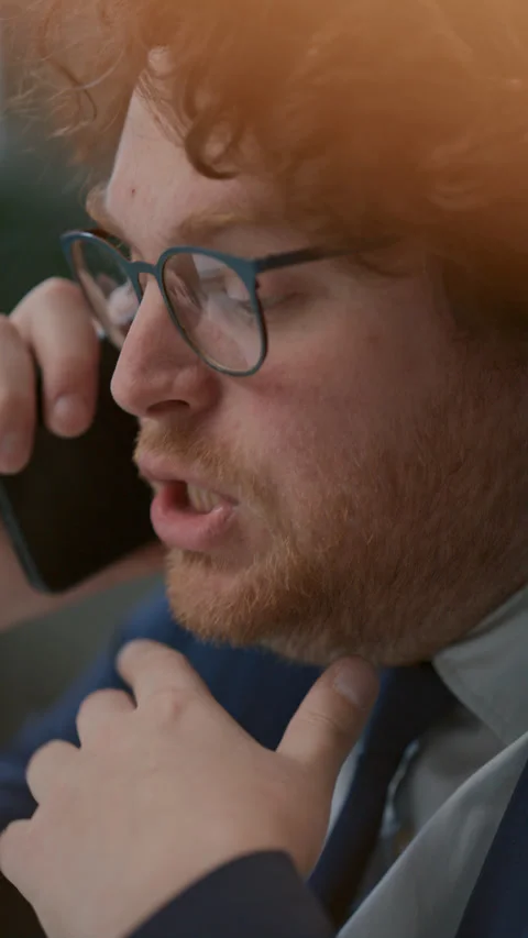 Close Up of Businessman Having Active Discussion on Mobile Phone Stock-Footage 331558330