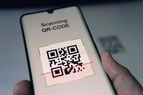 Close-up Of Businessman Scanning. Barcode Using Cell Phone Stock Photos