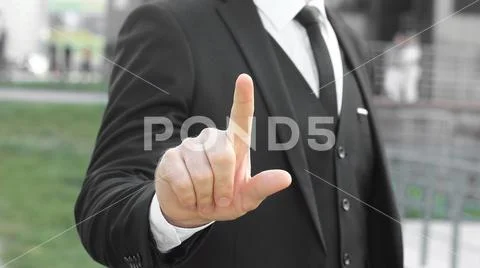 Close up.businessman showing index finger up Stock Photos