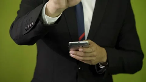 Close up of businessman touching virtual screen, green background chroma key  Stock Footage 275351284