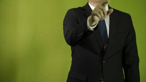 close up of businessman touching virtual screen, green background chroma key  Stock Footage 275351822