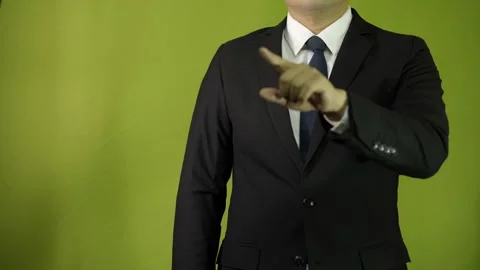 Close up of businessman touching virtual screen, on green backgroundchroma  Stock Footage 275352081