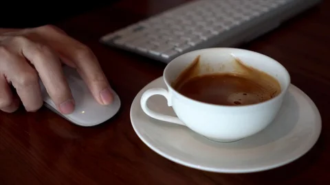Close Up Of Businessman Typing And Drinking Coffee. Stock Footage 69786964