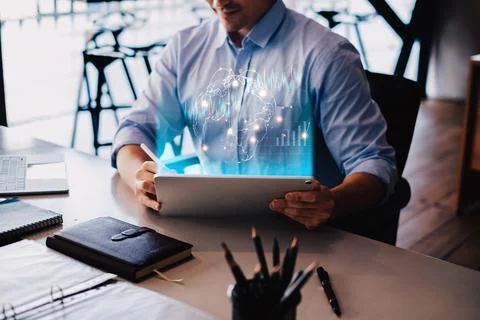 Close up Businessman using digital tablet searching about digital asset in Foto stock