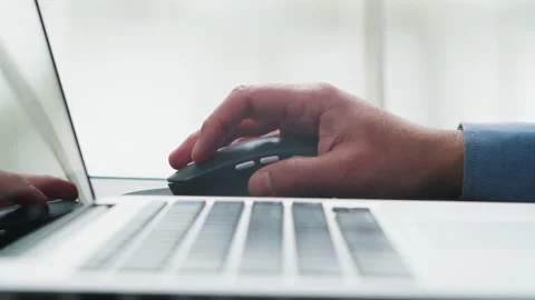 Close Up of Businessman Using Mouse of Computer Stock Footage 232502999