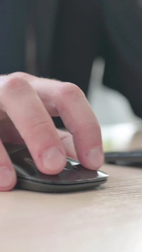 Close Up of Businessman Using Mouse of Computer, vertical video Video stock 328977772
