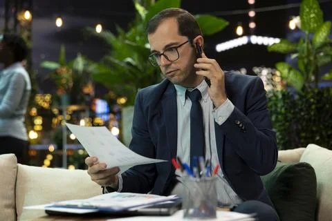 Close up of businessman using smartphone for networking call Stock Photos