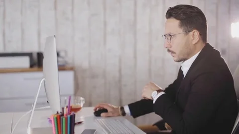 Close up of a businessman work with computer in the office Stock Footage 83609170